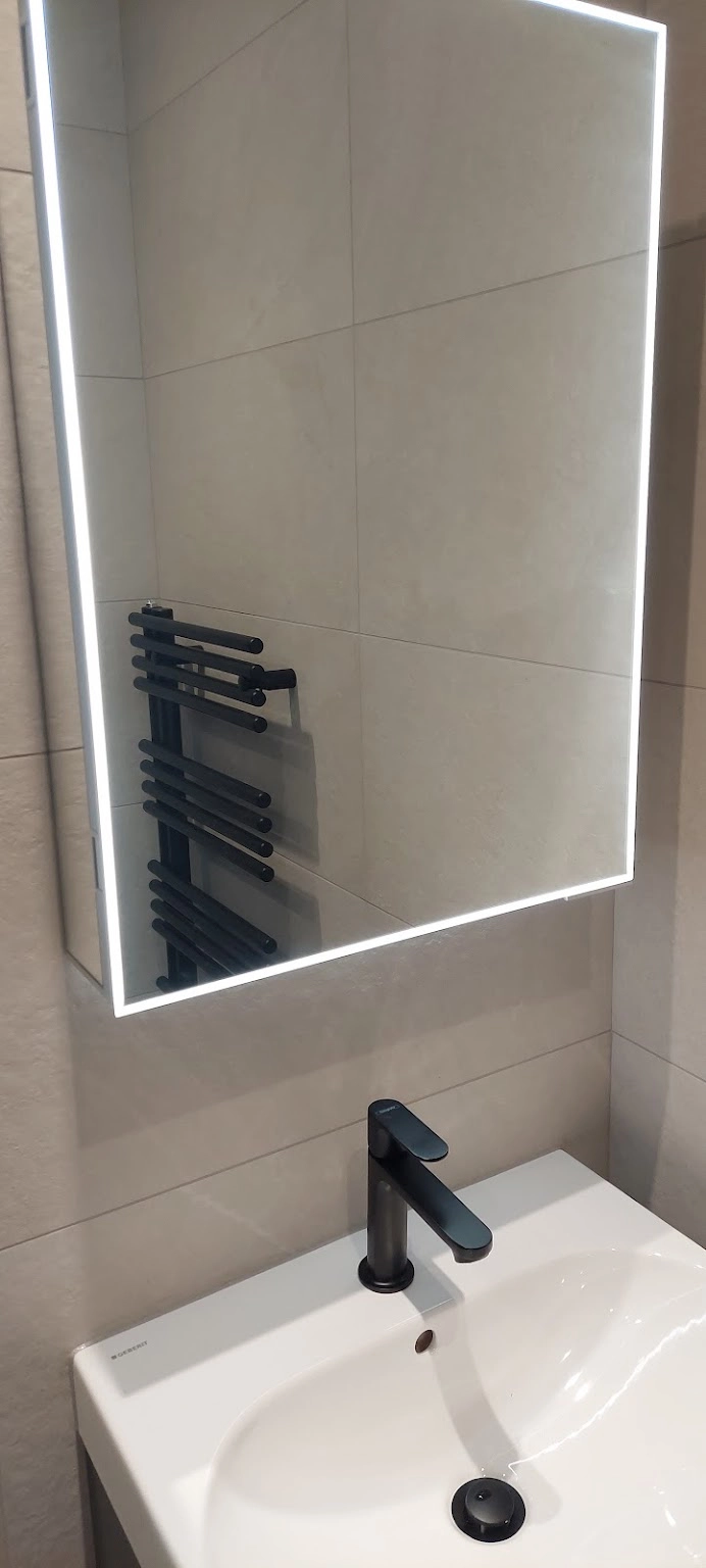 Illuminated mirror from bathroom redesign