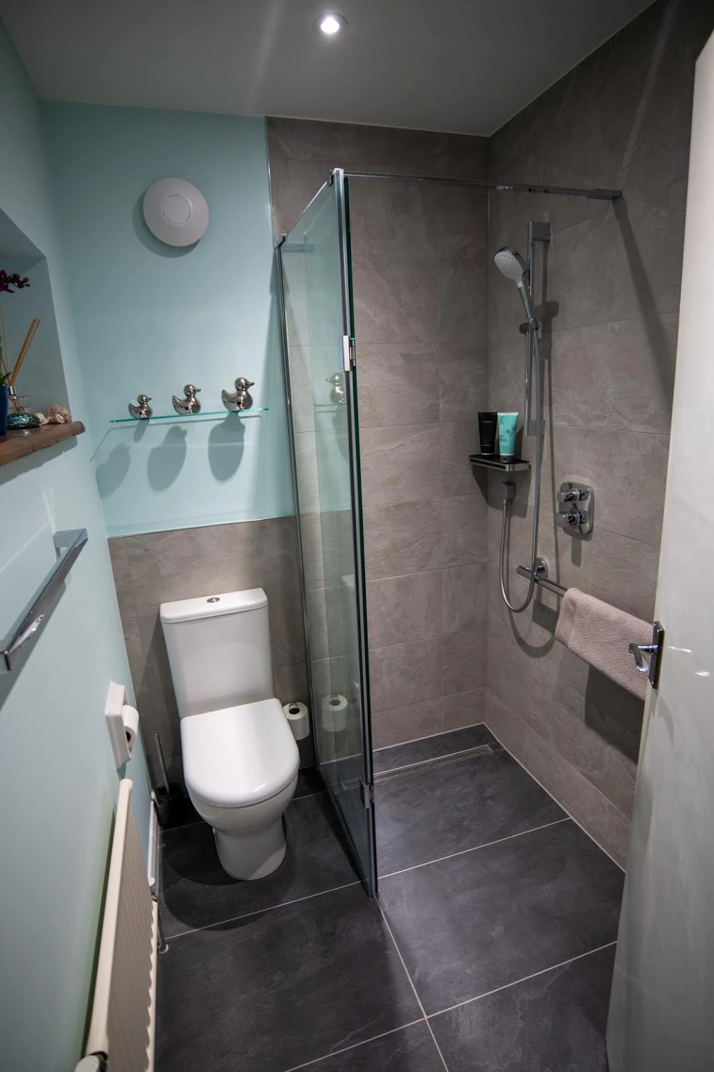 New Bathroom Renovation with walk in shower enclosure and chrome fittings